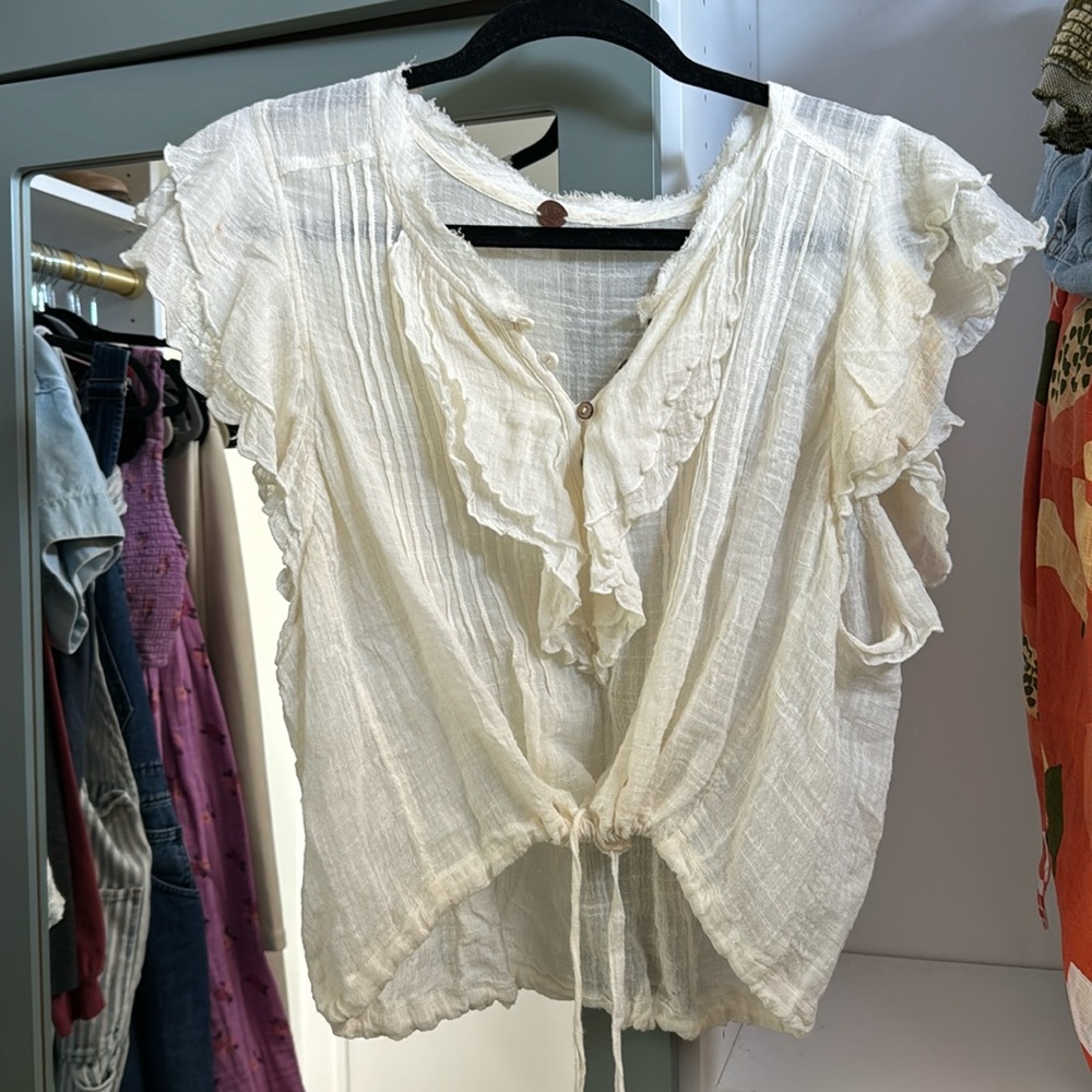 Free people size small ivory, sheer, ruffle top